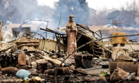Aftermath of the Marshall Fire<br>A statue stands amidst the remains of homes destroyed by the Marshall Fire in Louisville, Colorado, U.S. December 31, 2021. REUTERS/Alyson McClaran TPX IMAGES OF THE DAY