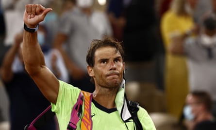 Rafael Nadal waves to the crowd after losing his French Open semi-final to Novak Djokovic
