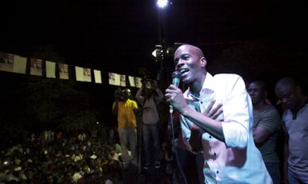 Jovenel Moïse, President Michel Martelly’s designated successor, speaks at an electoral campaign rally in Port-au-Prince on 8 January.