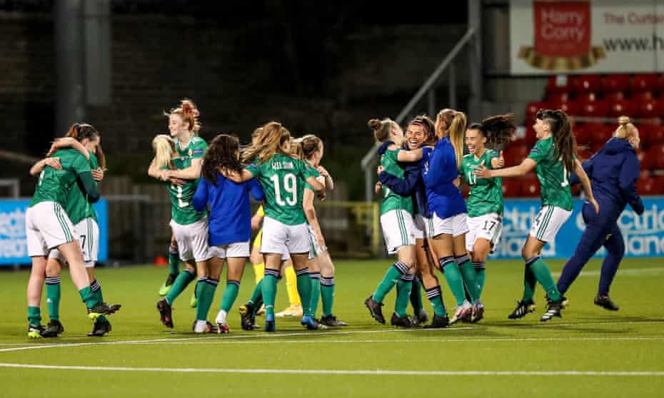 The Northern Ireland players celebrate after winning at the Seaview Stadium in Belfast