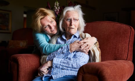 Kate Holt at home in Kentmere, Cumbria, with her mother Shirley who she removed from a care home after becoming concerned for her health.