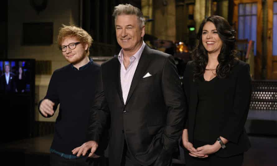 Alec Baldwin poses with Ed Sheeran and Cecily Strong