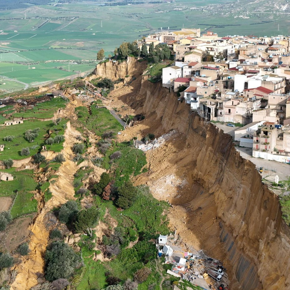 Situation is dire' for Sicily town teetering on cliff edge after landslide | Italy | The Guardian