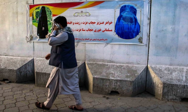A mural on a wall in Kabul bearing a face veil pronouncement
