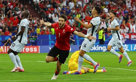Kvaratskhelia propels Georgia to last 16 with famous win over Portugal | Euro 2024 | The Guardian