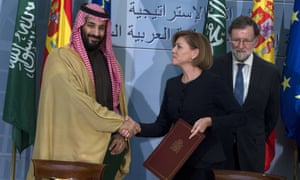 MarÃa Dolores de Cospedal and Mohammed bin Salman shake hands