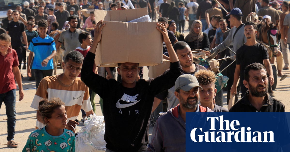 Palestinians return to Rafah food centre where Israeli troops opened fire – video