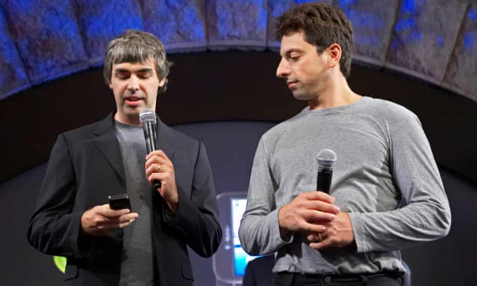 Larry Page (left) and Sergey Brin showing the G1 android phone in 2008.