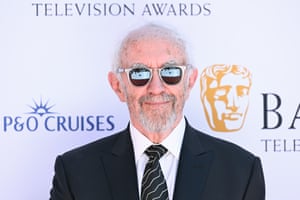 Jonathan Pryce wearing sunglasses