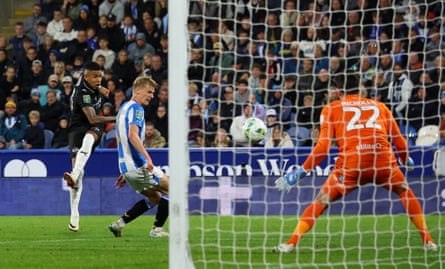 Manchester City’s Savinho scores their second goal in the win at Huddersfield