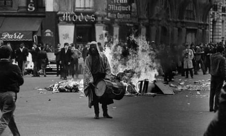 Tear gas silhouettes students May 23, 1968 on Boulevard Saint-Michel in Paris’ Latin quarter.