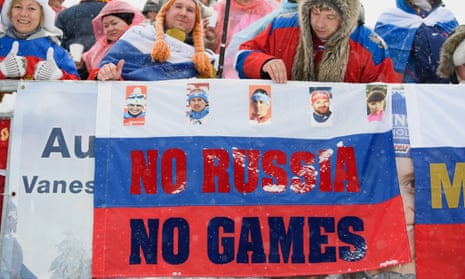 Russian fans demonstrate against the IOC ban from the Winter Olympics at the World Cup Biathlon in Hochfilzen, Austria