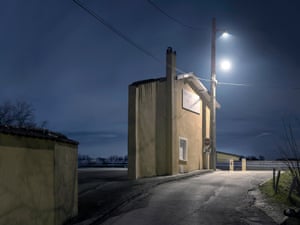 Photographs of eerie building facades at night after digital image manipulation by artist snd photographer  Zacharie Gaudrillot-Roy.