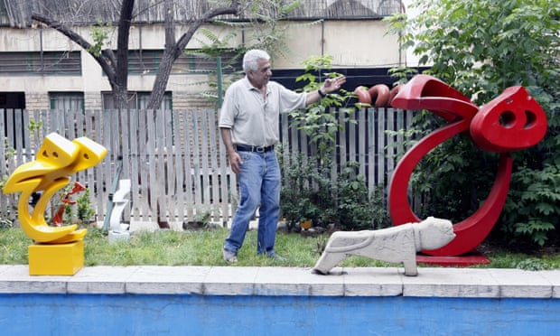 Parviz Tanavoli with two of his sculptures