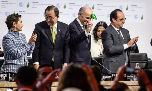 World leaders and UN officials agree on a global climate deal in Paris earlier this month. 