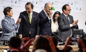 Leaders applaud the final climate change agreement in Paris. From left to right: executive secretary of the UN framework convention on climate change, Christiana Figueres; the UN secretary general, Ban Ki-moon; France’s foreign minister, Laurent Fabius; and President François Hollande.