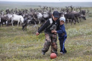 Sons of local herders play football