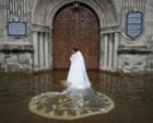 A bride wades through a flood to get married: Aaron Favila’s best photograph