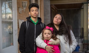 Rosa Trent with her children, Angel Hernandez and Marissa Trent on their porch in Camden, New Jersey