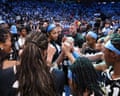 Angel Reese and her Atlanta Dream teammates celebrate after their 97-71 victory over the Golden State Valkyries in Game 3 of the WNBA finals on Wednesday night at State Farm Arena.