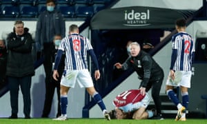 Grealish reacts after a tackle from Livermore.