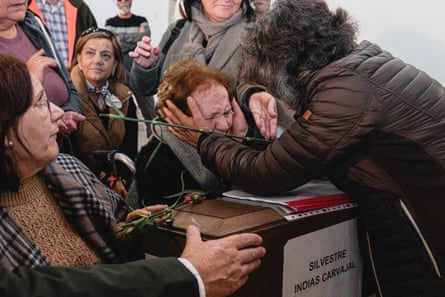 Silvestra Indias is embraced by a loved one