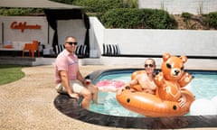 Rick Martinez and Brian Gordon in the swimming pool of their home in LA, with a bear blow-up ring