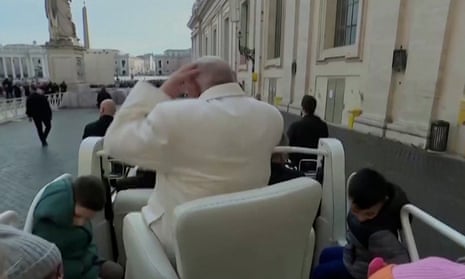 Papal cap blown off by gust of wind