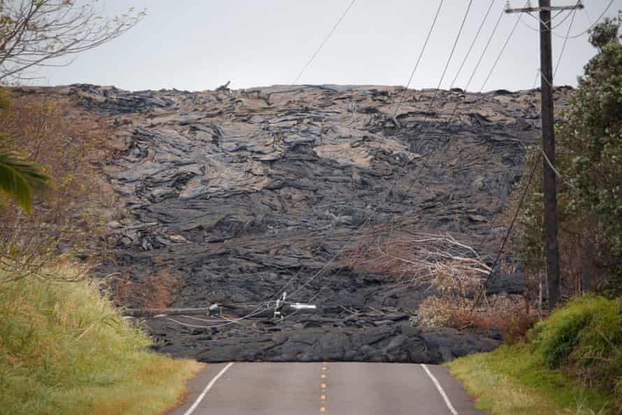 Lava covers a road on the outskirts of Pahoa.