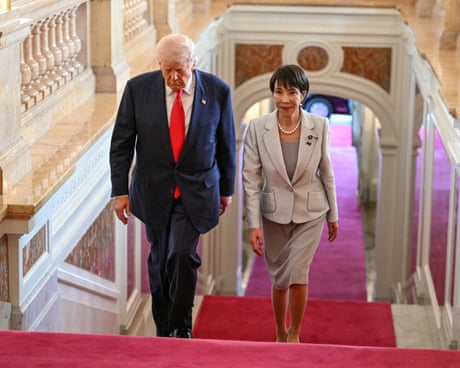 Donald Trump and Sanae Takaichi walking up stairs
