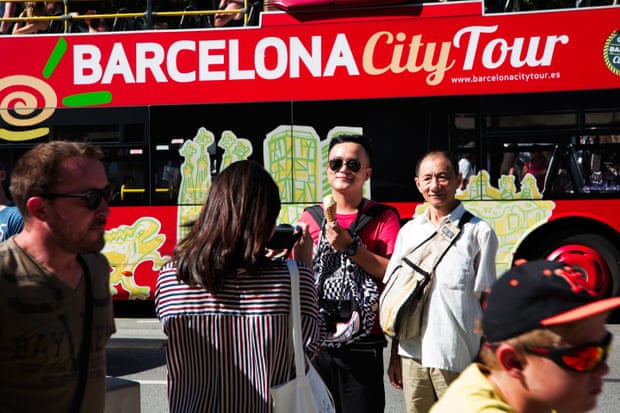 Tourists posing for snaps outside Sagrada Familia.