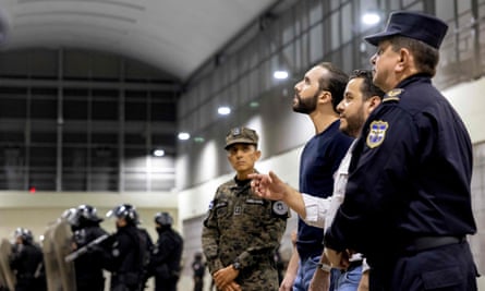 Nayib Bukele, third right, during an inspection visit at a prison intended to hold 40,000 suspected gang members.