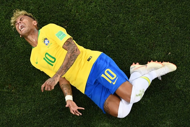 Brazil’s forward Neymar reacts after a tackle at the World Cup