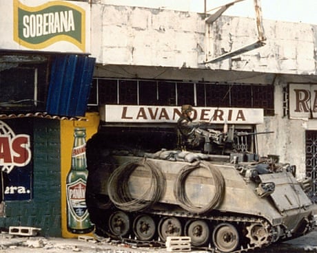 an armoured personnel carrier outside a building