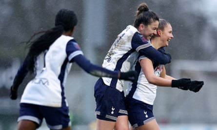 Olivia Holdt (right) of Tottenham gets congratulations from her teammates after scoring a decisive goal on her WSL debut