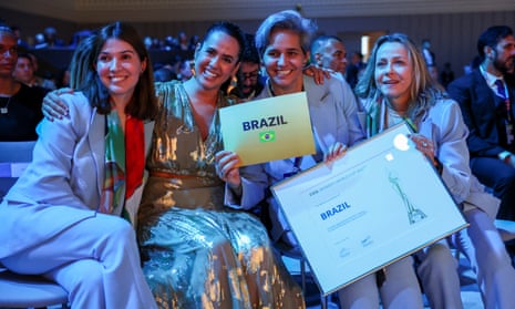 Members of the Brazilian delegation celebrate after Fifa awarded them the 2027 World Cup.