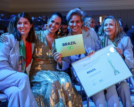 Brazil’s delegates celebrate their country winning the right to host the 2027 Women’s World Cup