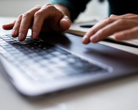 Close up of man typing connected keyboardClose up of man manus typing connected keyboard