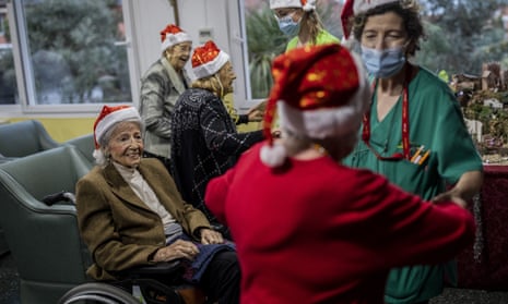 Care home residents celebrating Christmas last year when relatives were not allowed to visit.