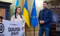 Ukrainian wrestler Oksana Livach holds a ticket for the Paris Olympic Games in Lviv last month.