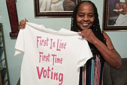 In this photo Betty Riddle in Sarasota, Fla., holds the T-shirt she wore on March 17, 2020, when she voted for the first time. She was barred from voting in Florida until a federal judge intervened.