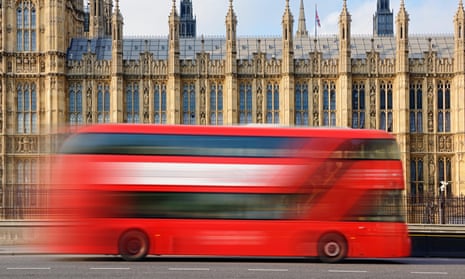 A London bus passing the Houses of Parliament.