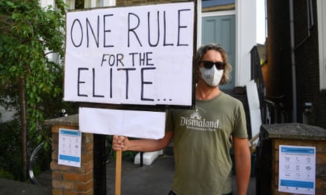 A protester outside the home of Dominic Cummings, London, 25 May.
