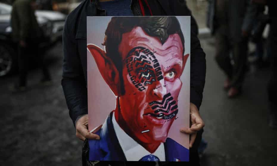 Protesters in Istanbul portray Emmanuel Macron as a devil on 30 October.