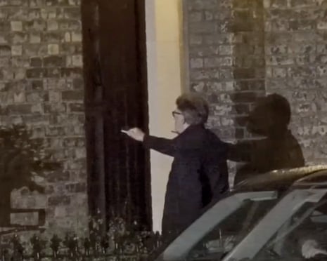 Peter Mandelson returns to his home after being released on bail after his arrest.