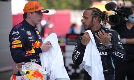 Lewis Hamilton and his title rival Max Verstappen talk after the Spanish Grand Prix in May.