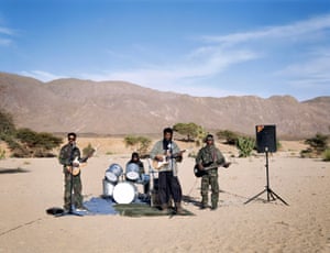 Bibi, Al Hussein, Mohamed and Akli, part of a music band of Touareg rebels spreading their message across the Sahel region. The group was created in the 1990s as the first rebellion took place