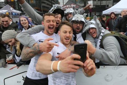 Toronto Wolfpack players Greg Worthington and Rhys Jacks pose for a selfie with fans after their 62-12 win over the Oxford in May 2017.