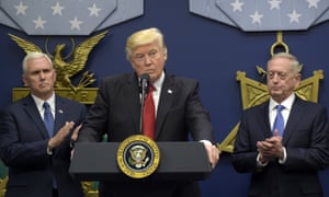 Donald Trump speaks at the Pentagon, flanked by Vice-President Mike Pence and the defense secretary, the retired general James Mattis.
