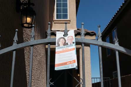 an election flyer hangs on a gate